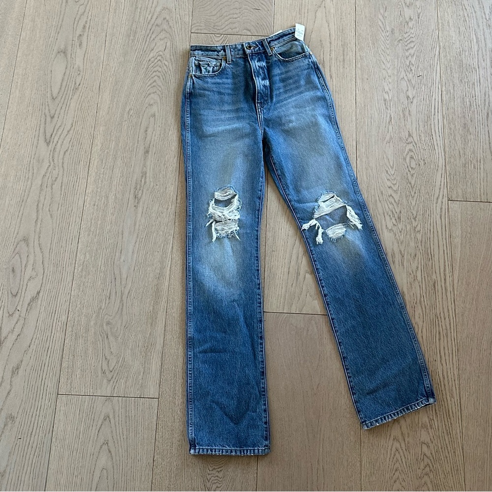 KHAITE Straight-Leg Distressed Jeans in Medium Blue